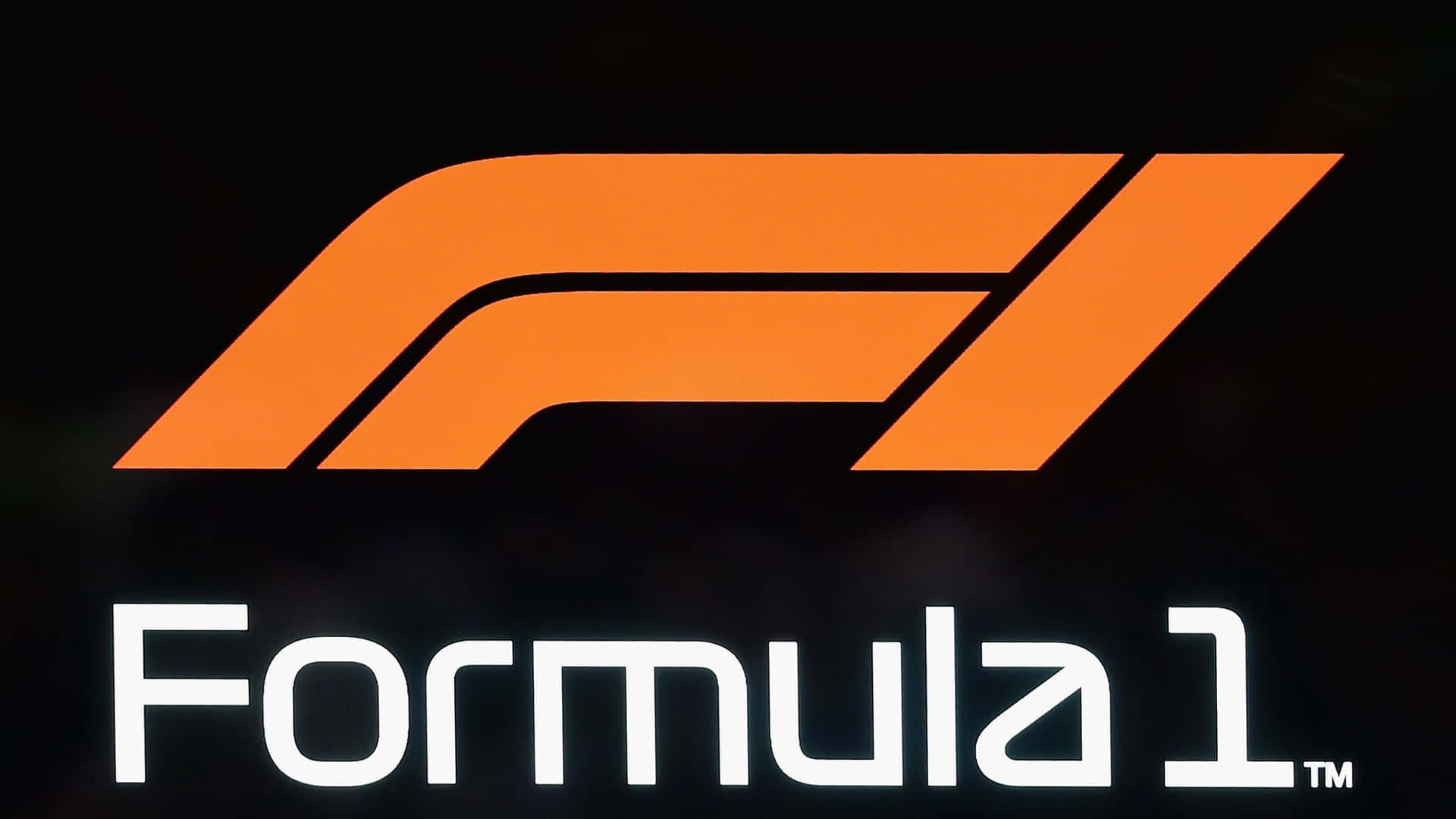 Formula1-logotyp Med Orange Och Svarta Bokstäver.