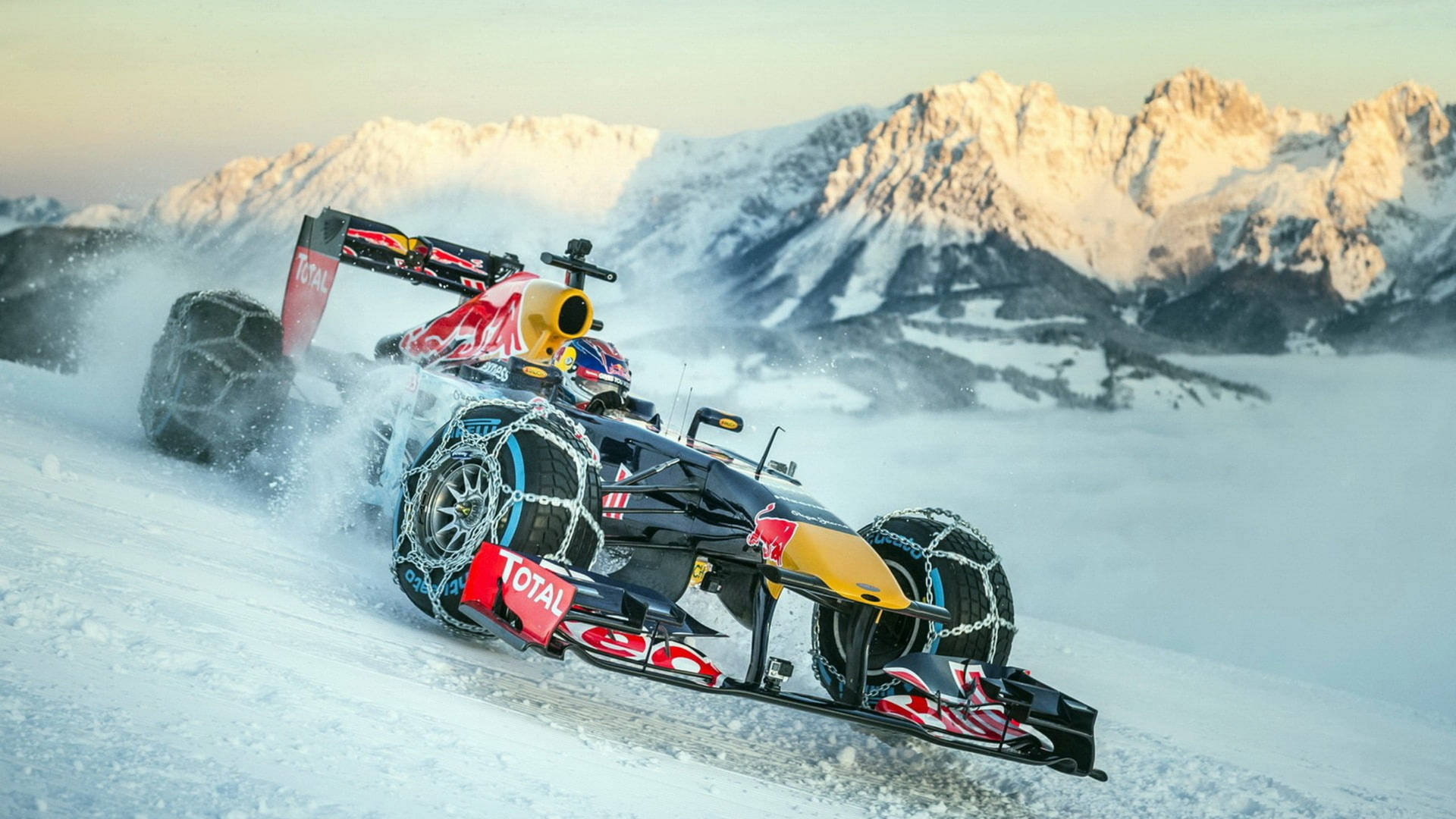 F1 Racing Car In Snow Road Wallpaper