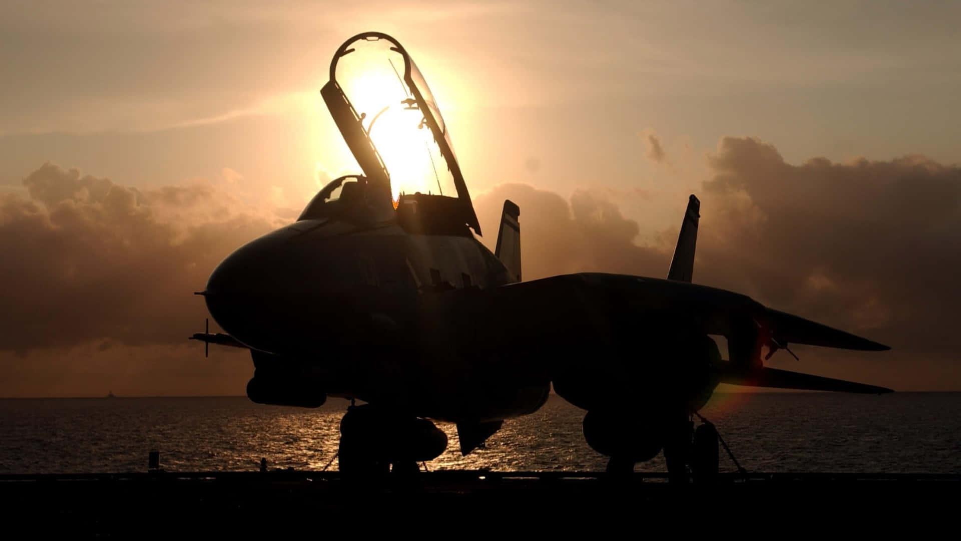 F14 Jet Silhouetteat Sunset Wallpaper