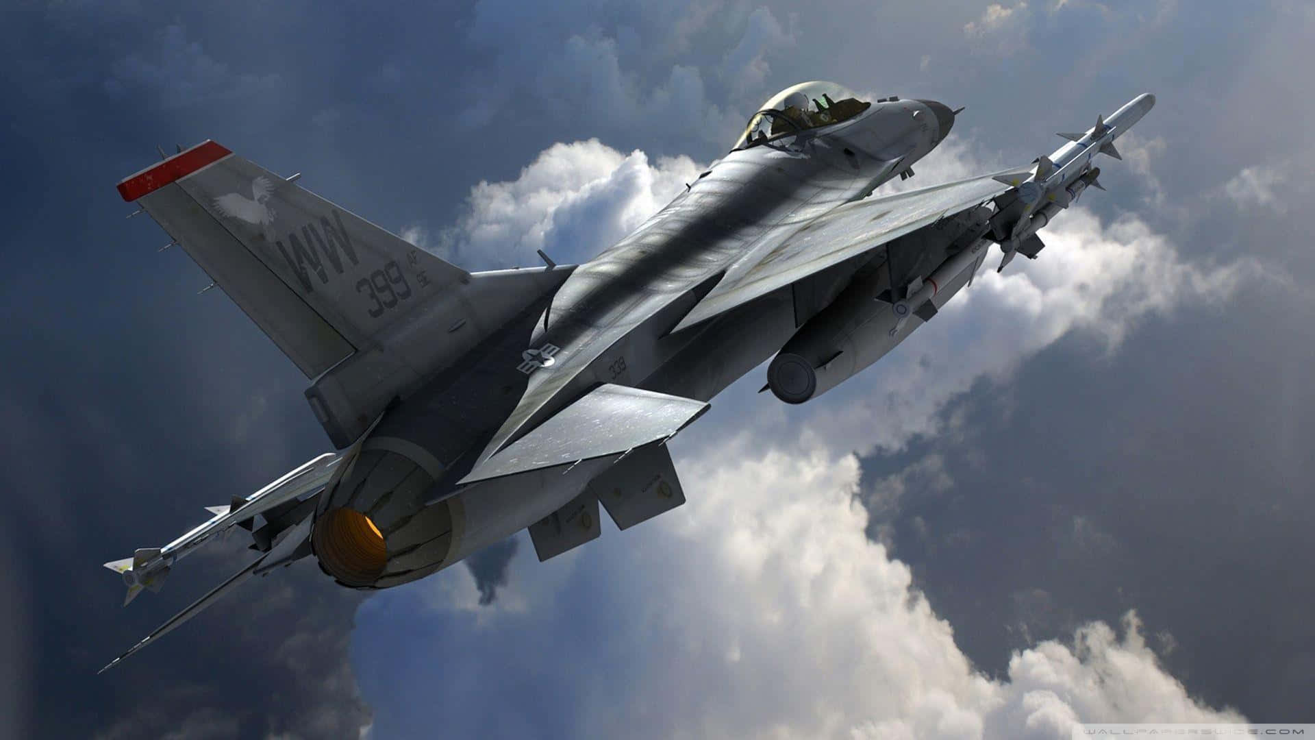 F16 Fighter Jet Against Cloudy Sky Wallpaper