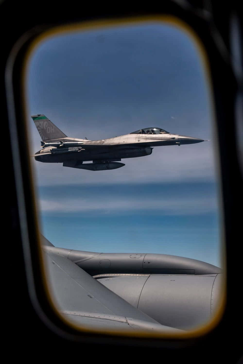 F16 Jet Viewed Through Aircraft Window Wallpaper