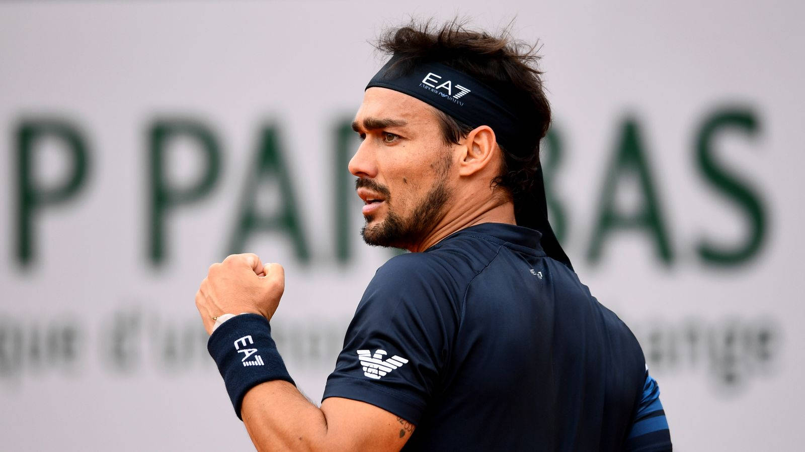Fabio Fognini Celebrating Victory with a Clenched Fist. Wallpaper