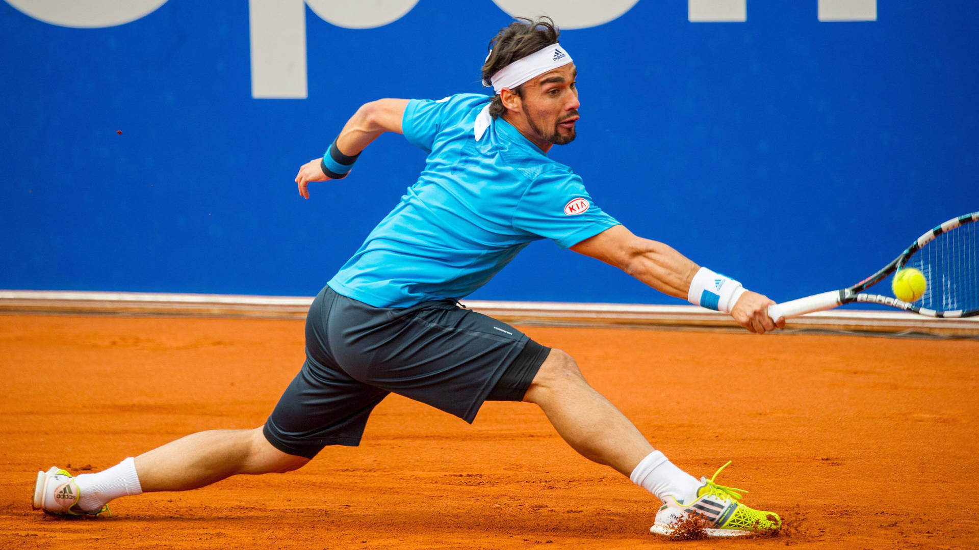 Fabiofognini Sträcker Sig För Att Nå Bollen. (this Could Potentially Be Used As A Caption For A Wallpaper Image Of Fabio Fognini Playing Tennis And Reaching For The Ball.) Wallpaper