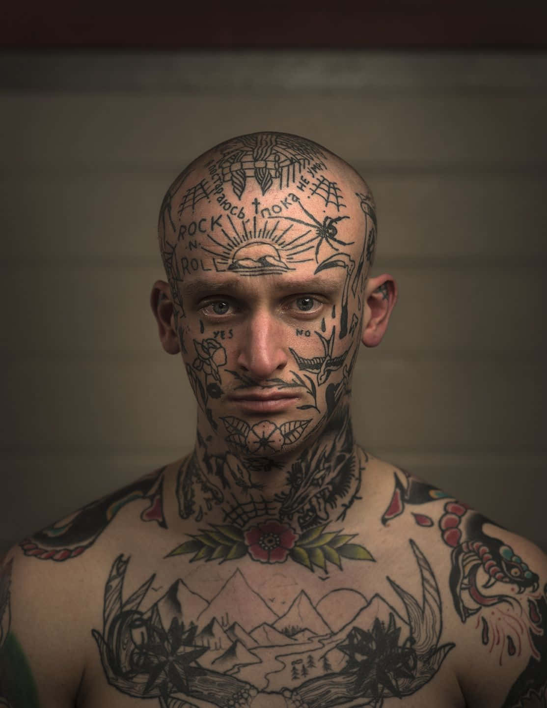 A Man With Tattoos On His Head