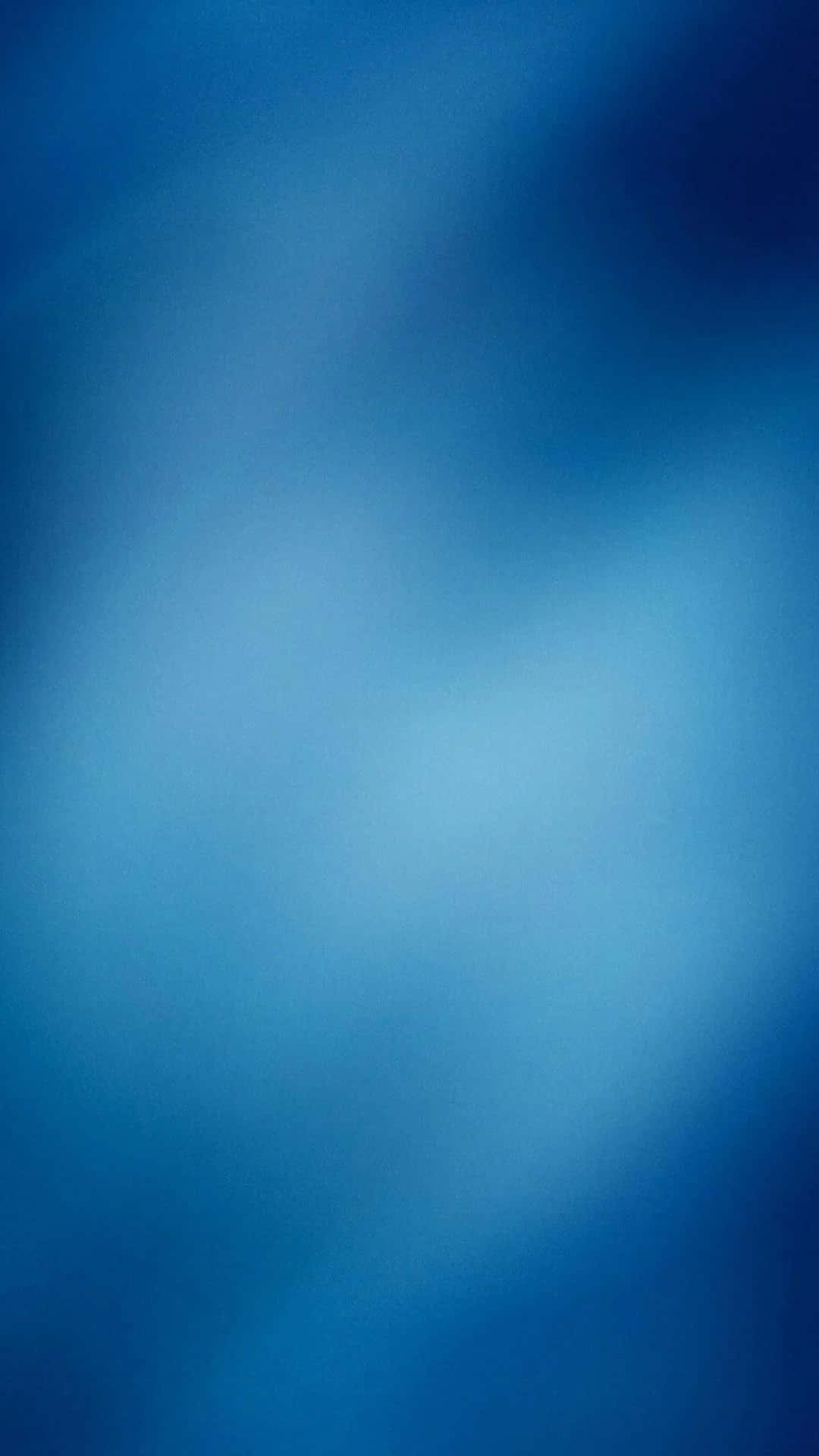 A Blue Background With A Blurred Background
