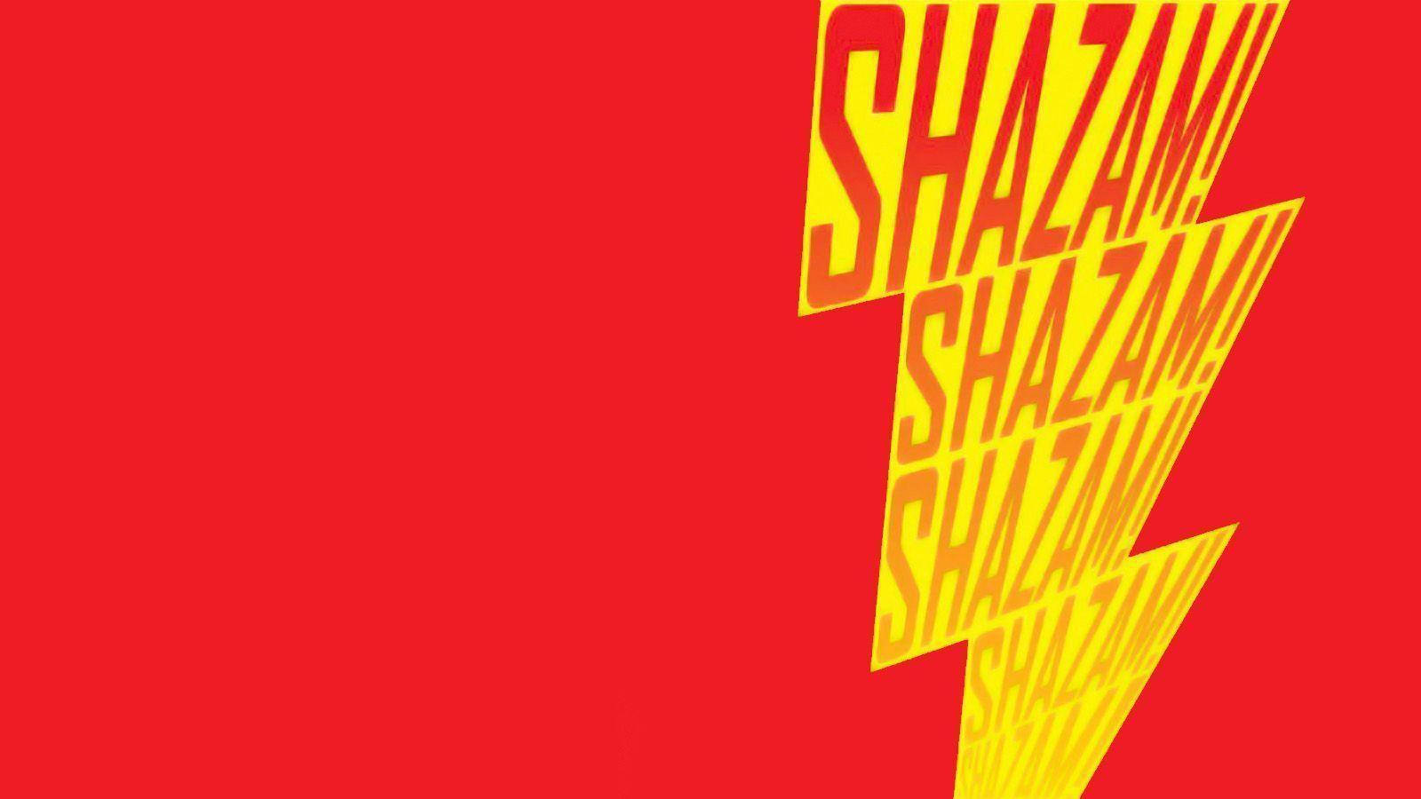 Shazam Superhero Logo Illuminated Against Dark Background Wallpaper