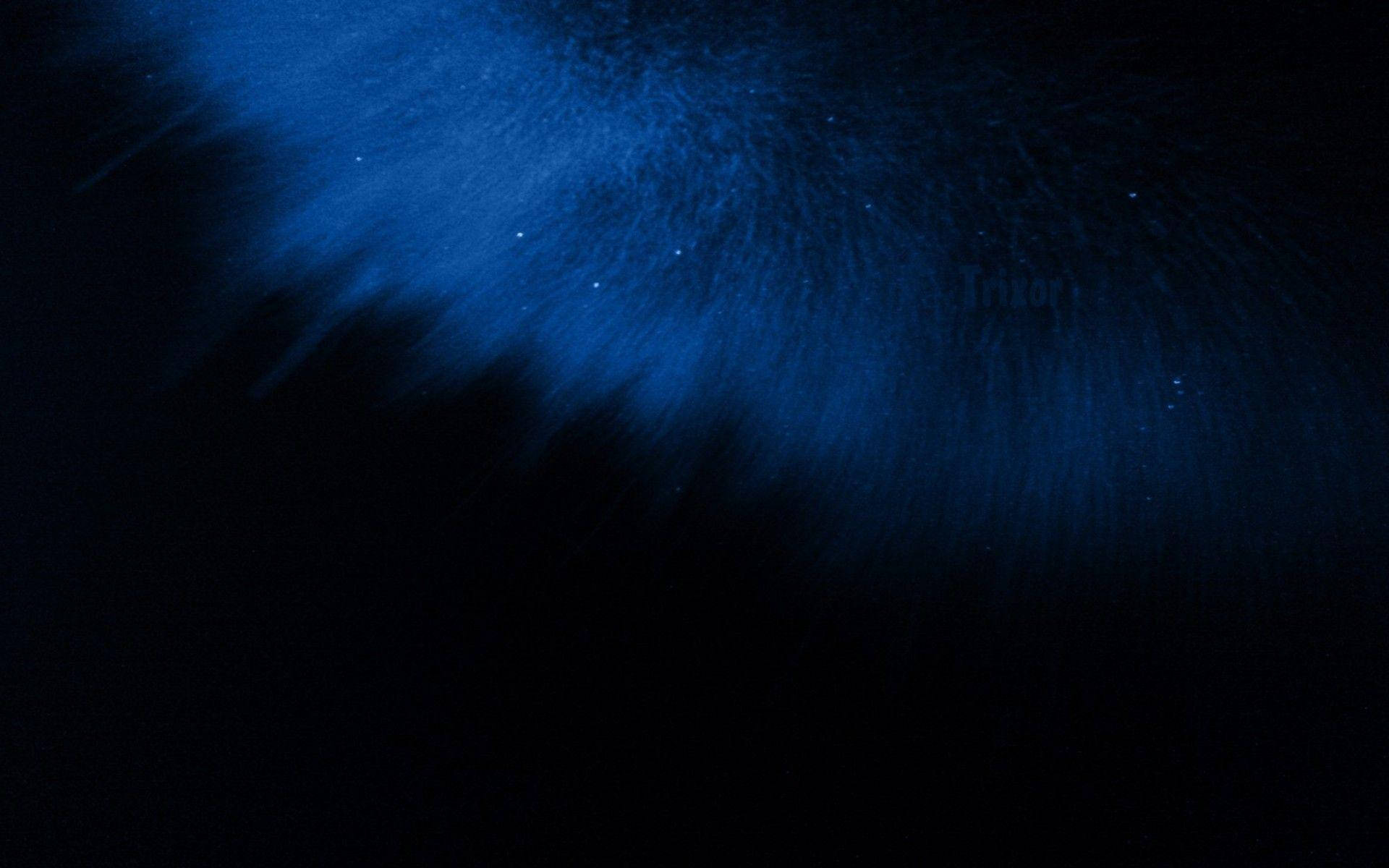 Faint Light Leak On Black And Blue Background Picture