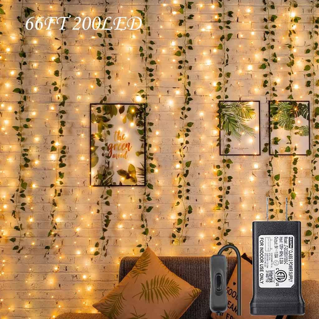 A Living Room With A Christmas Light String Wallpaper