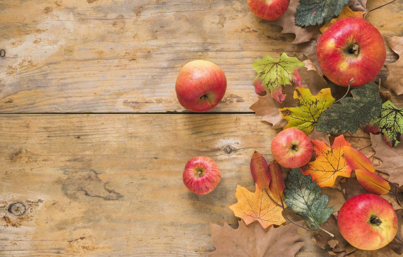 A bountiful harvest of fall apples Wallpaper