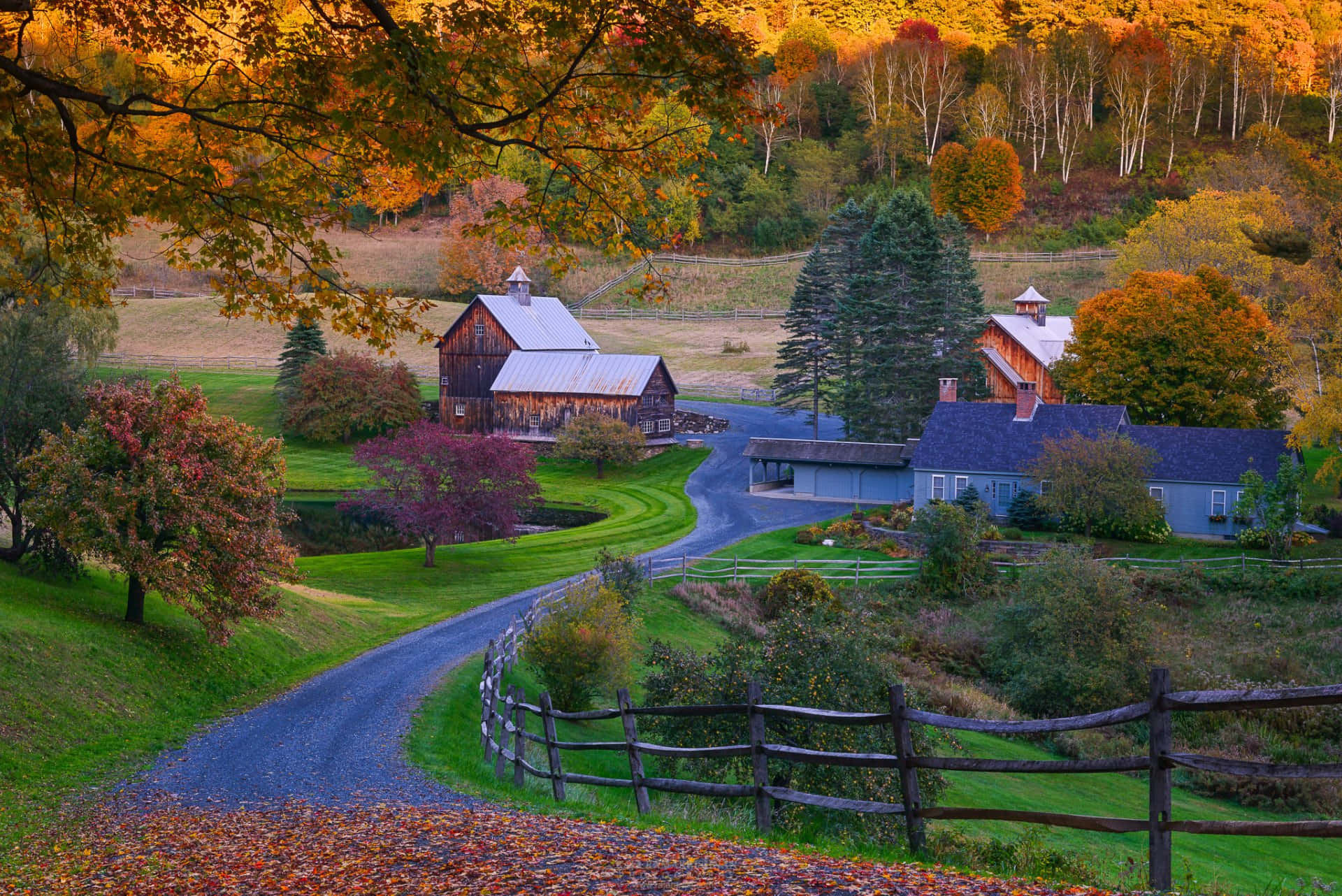 Scenic Fall Barn Surrounded by Autumn Trees Wallpaper