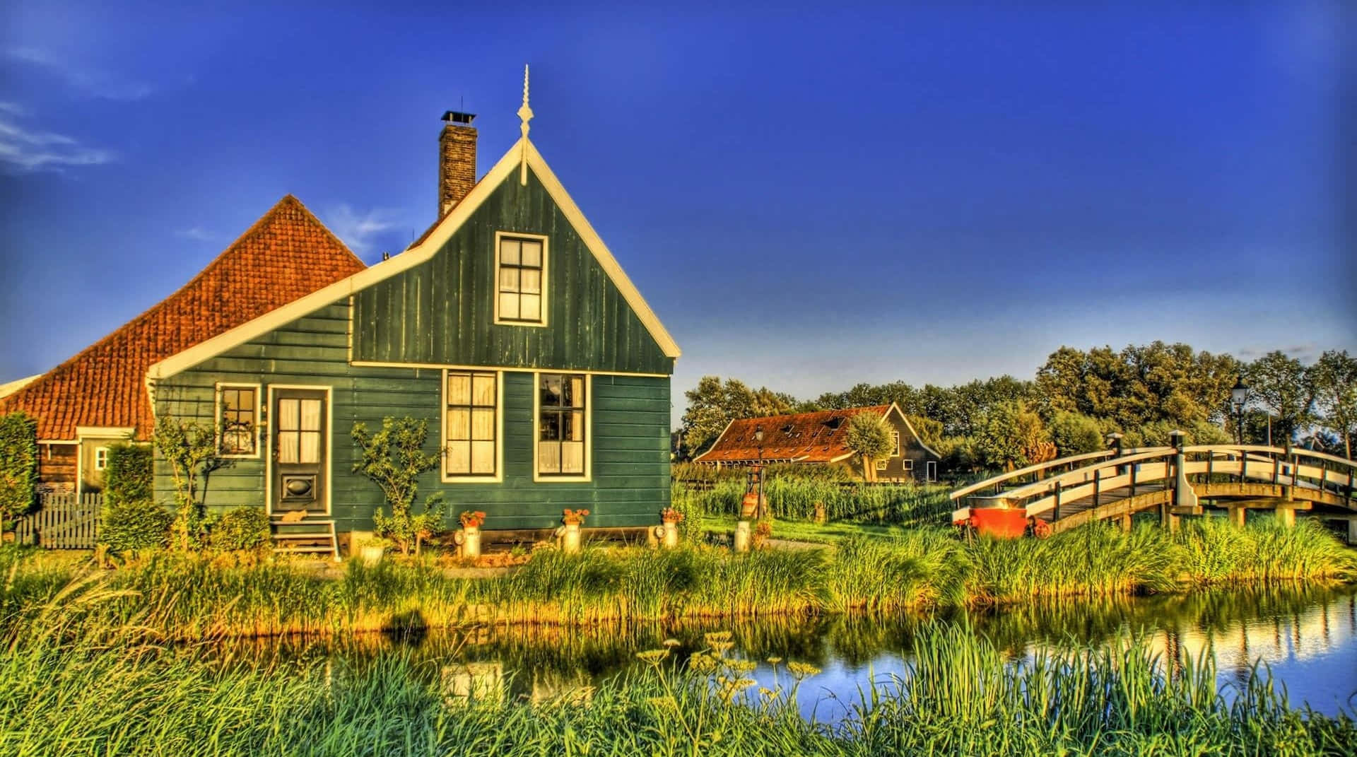 Fall Farmhouse in a Serene Landscape Wallpaper