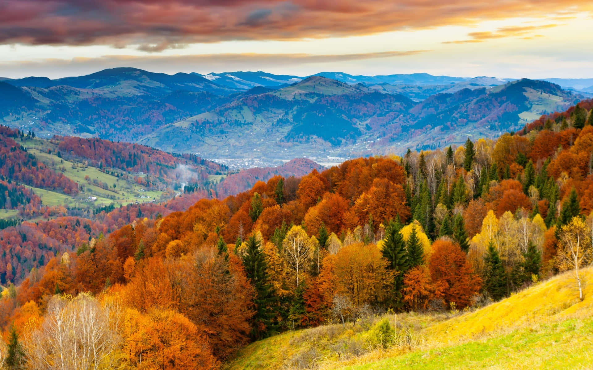 Enjoy the beauty of a serene fall mountain scene Wallpaper