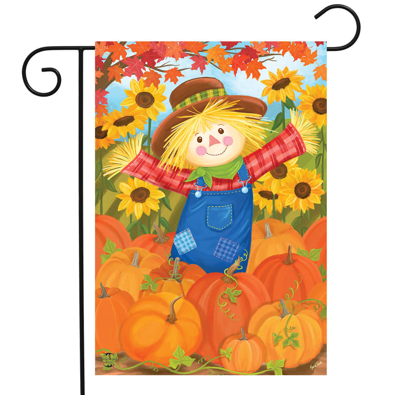 A scarecrow in a vibrant autumn field Wallpaper