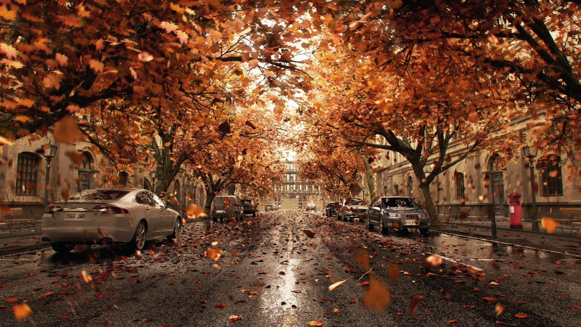 Fall Town Scenery - A picturesque view of a quaint town during autumn. Wallpaper