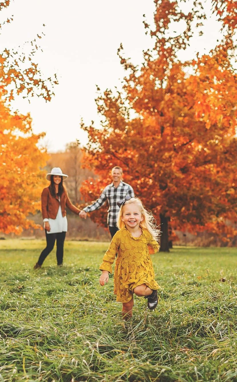 Girl Running In Park Family Fall Pictures