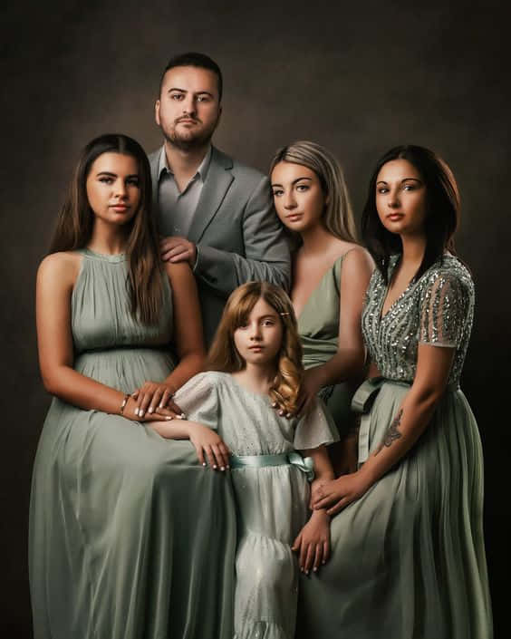 Elegant Family Portrait Of Five Wallpaper