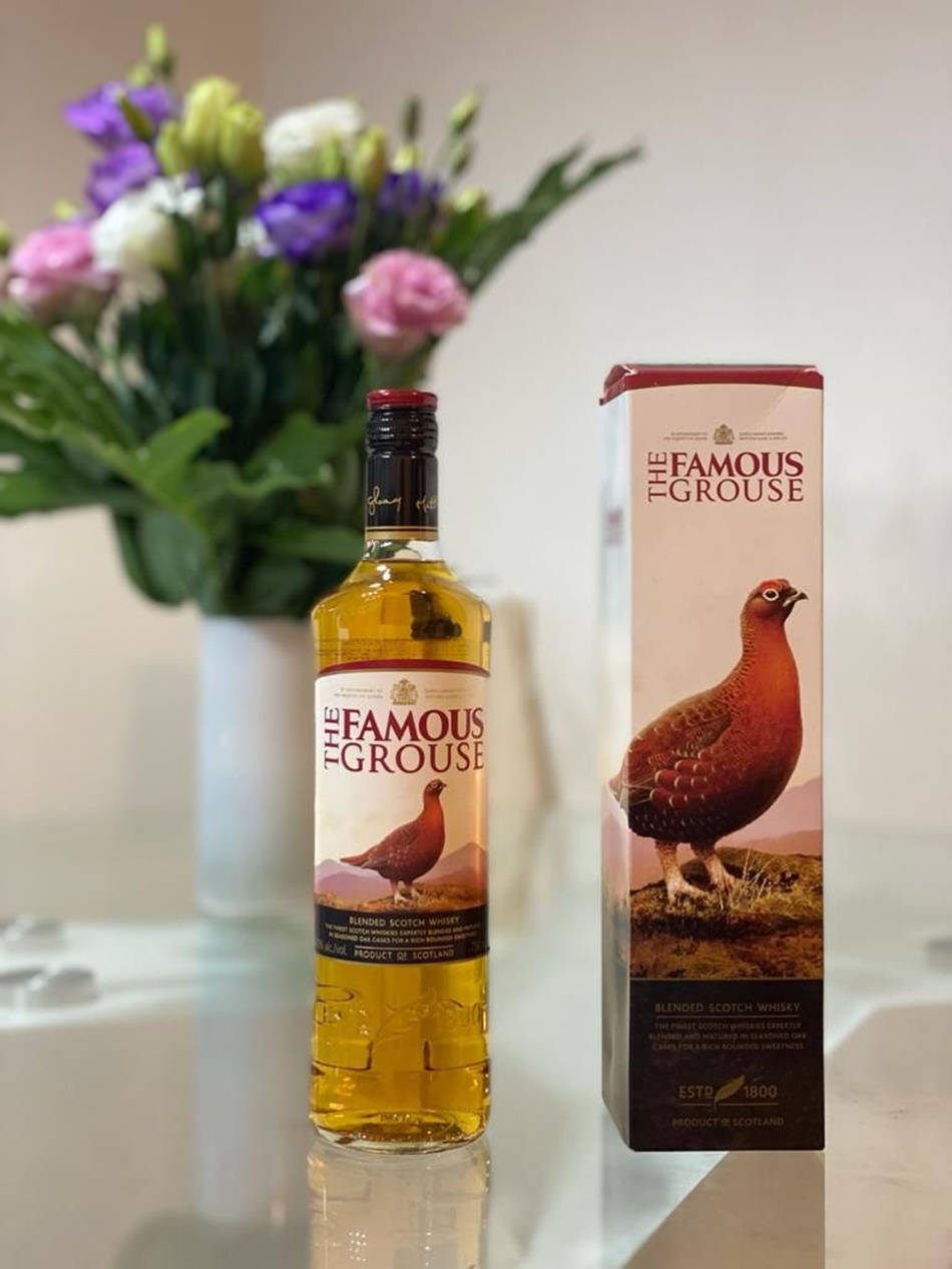 Elegance in a Bottle - Famous Grouse Scotch Whisky Wallpaper