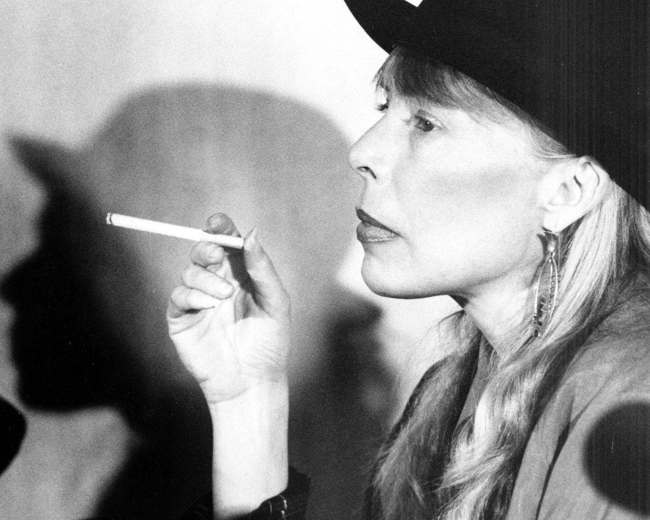 Famous Singer Joni Mitchell Smoking Background