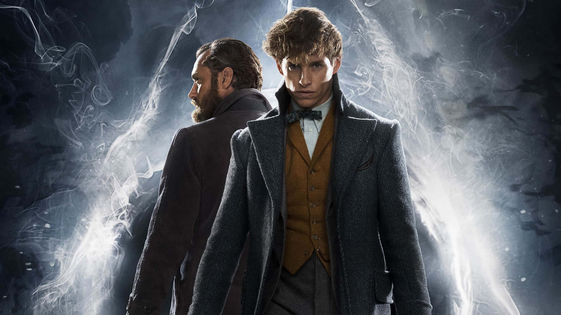 Fantastic Beasts Wallpaper featuring Newt Scamander with magical creatures Wallpaper