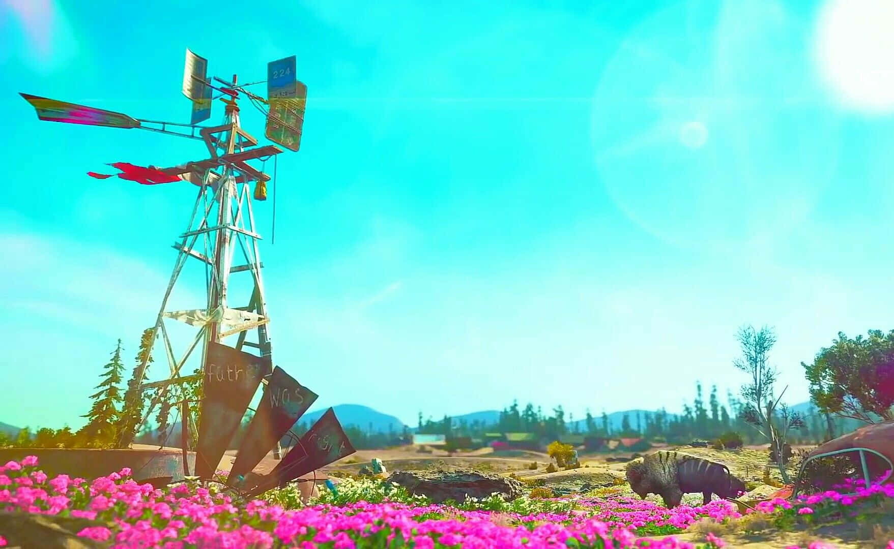 A Windmill In The Middle Of A Field Of Flowers