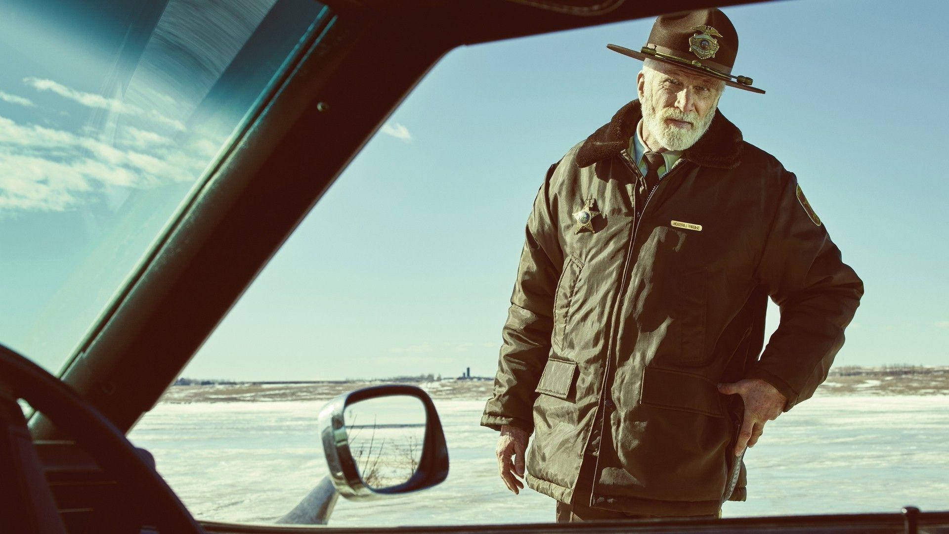 Caption: Elderly Man in Fargo Pondering Life Wallpaper
