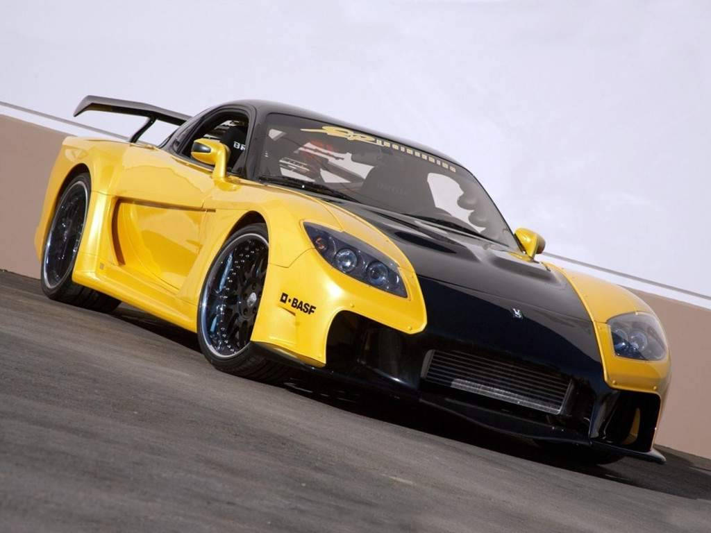 Dramatic Fast and Furious Cars in Yellow and Black Wallpaper