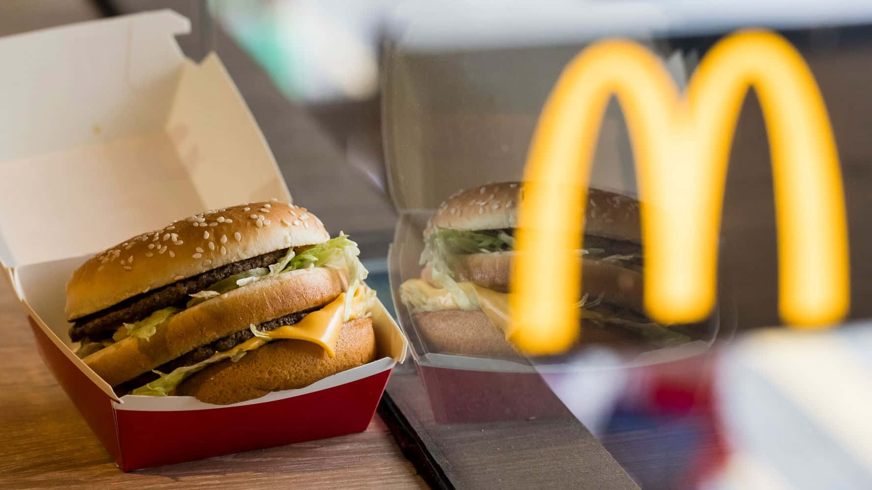 A Mcdonald's Burger Is Sitting In A Box