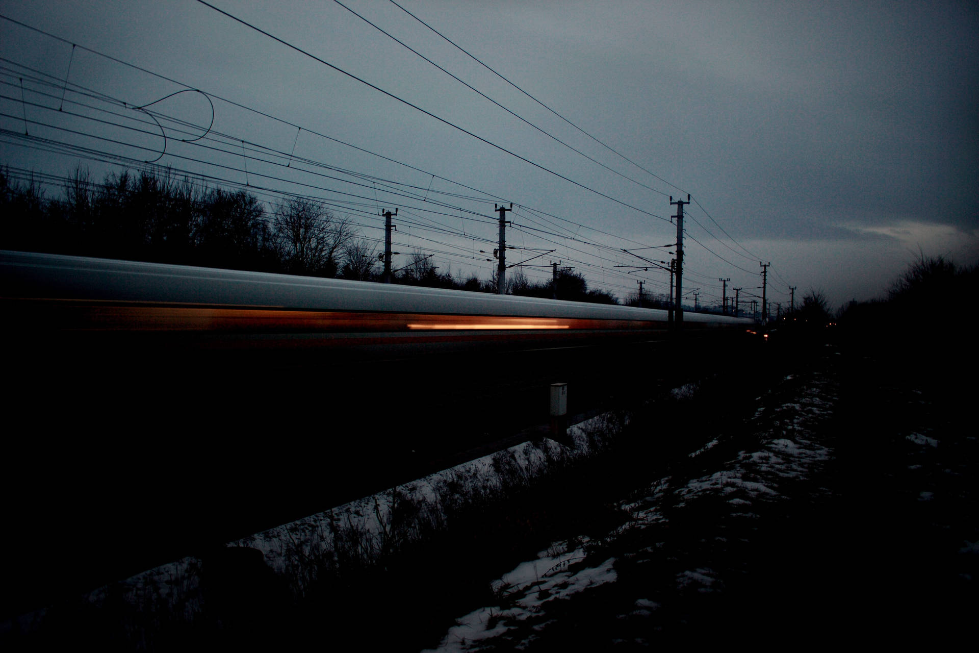 Fast Train Speeding Through The Night Wallpaper