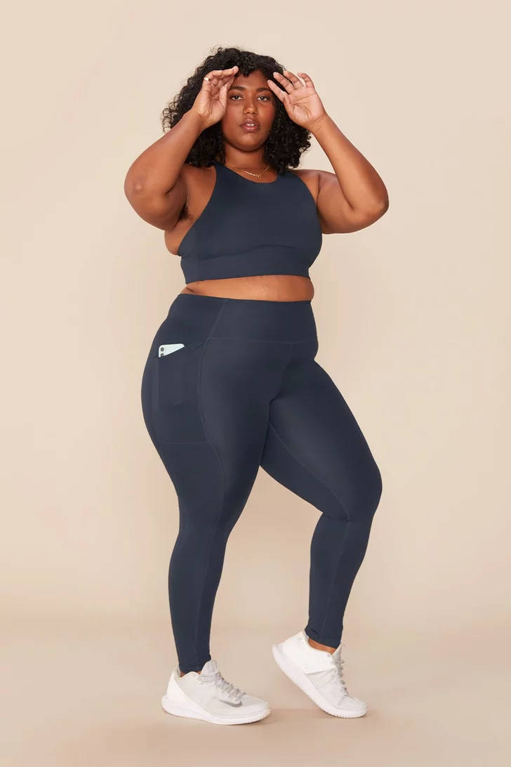 Fat Black Woman In Sporty Attire Wallpaper