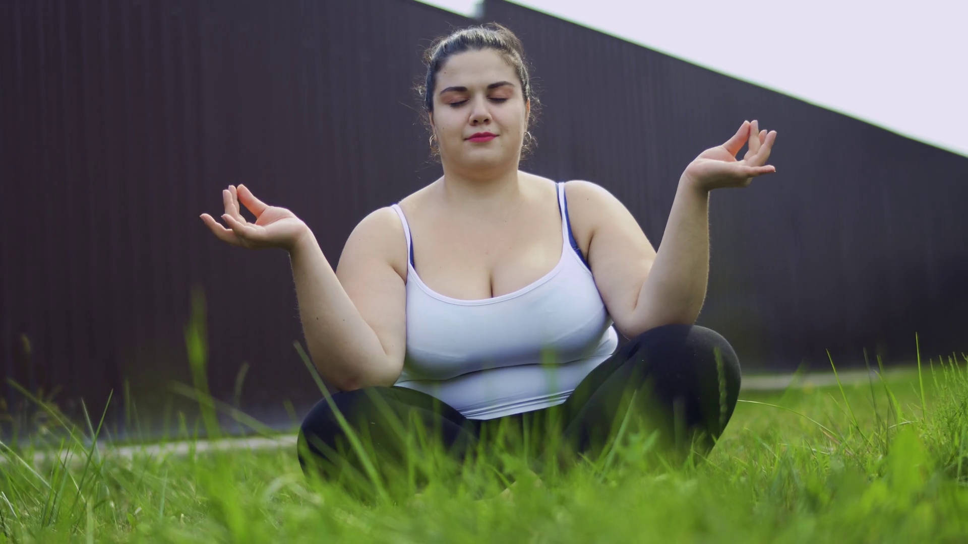 Fat Girl In Yoga Lotus Position Wallpaper