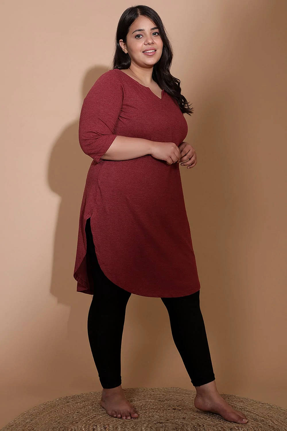 A Confident Plus-size Individual in Bright Red Apparel Wallpaper