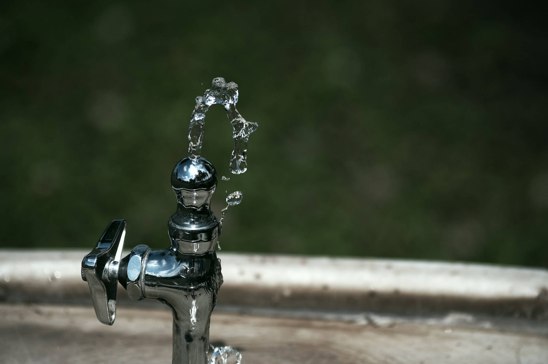 Faucet And Moving Water Wallpaper