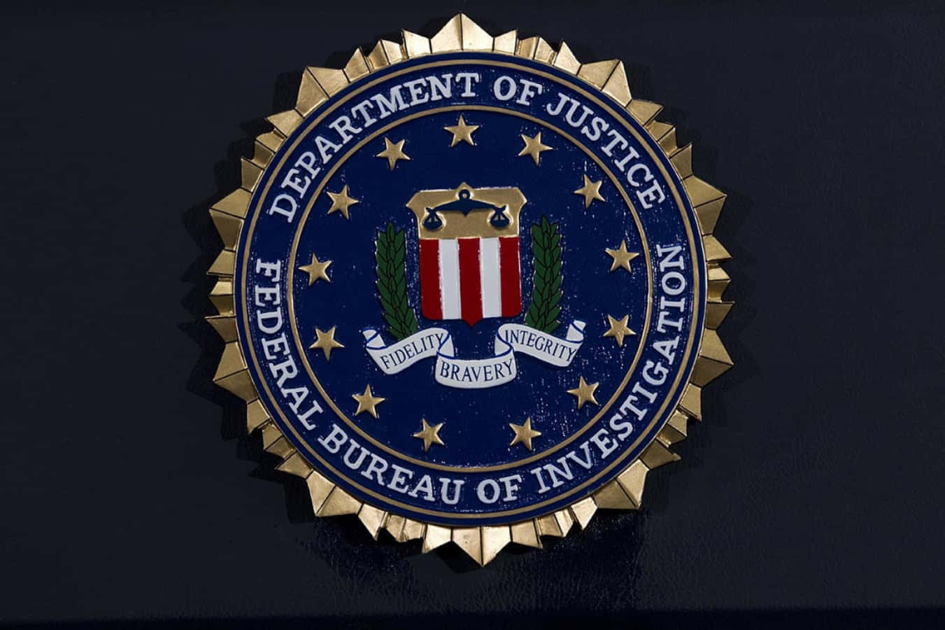 The Fbi Logo Is Shown On A Black Background