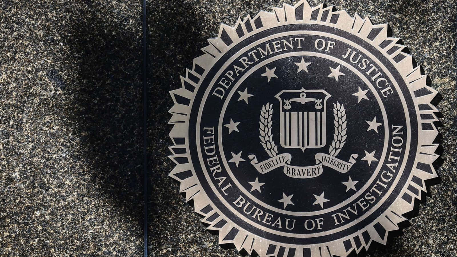 The Fbi Logo Is Seen On The Wall Of The Building