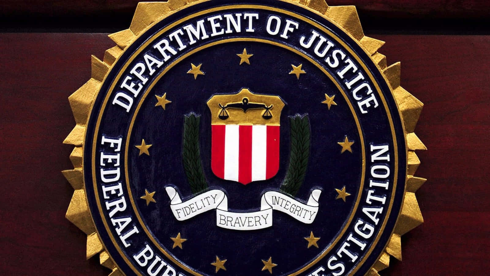The Fbi Logo Is Shown On A Wall