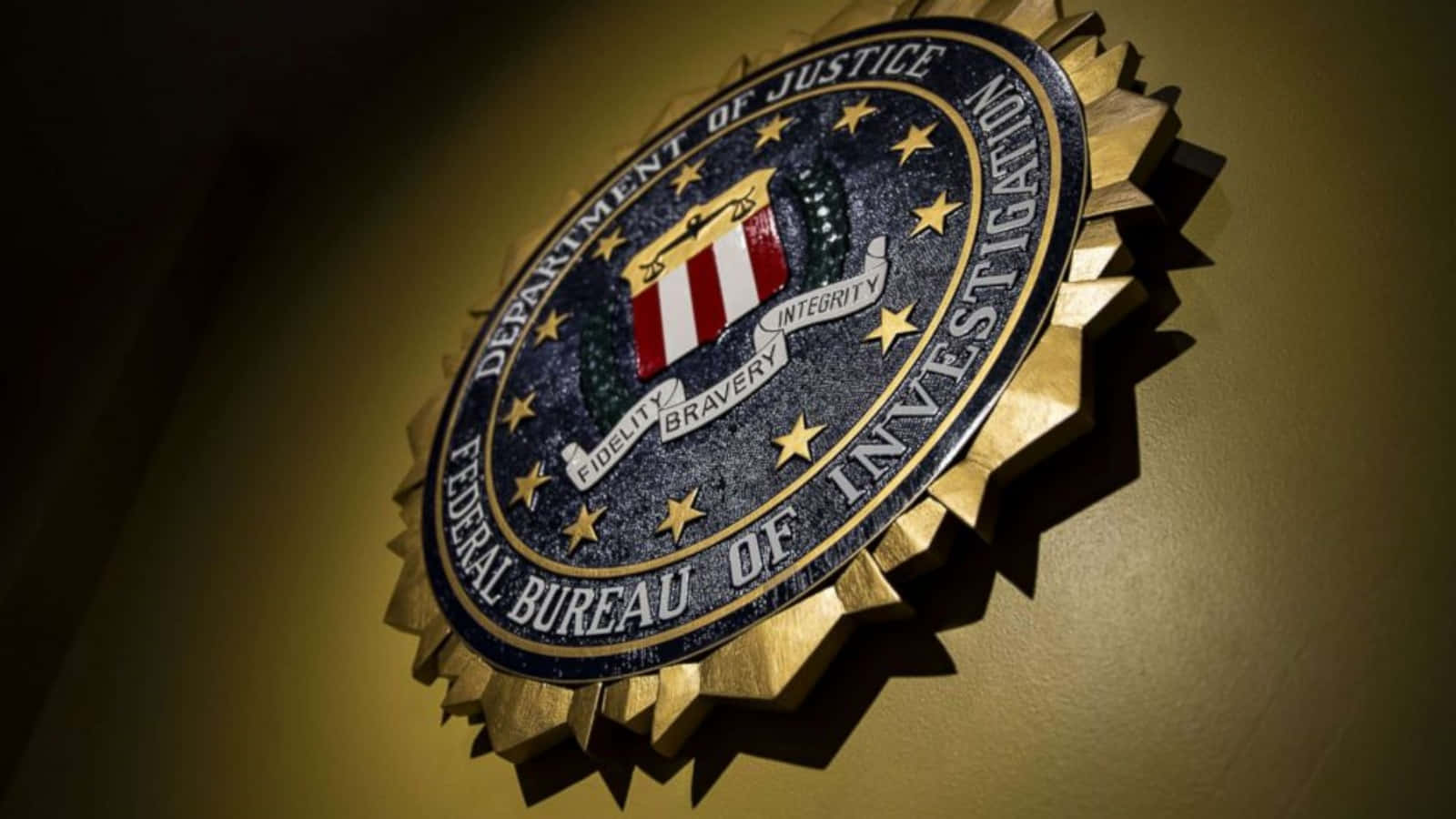 The Fbi Seal Is Seen On The Wall
