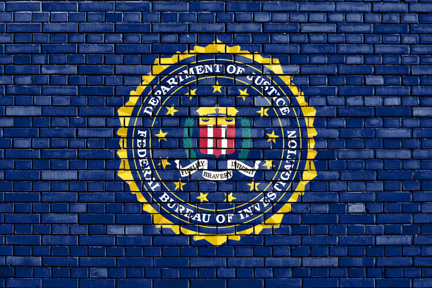 The Fbi Logo Is Painted On A Brick Wall