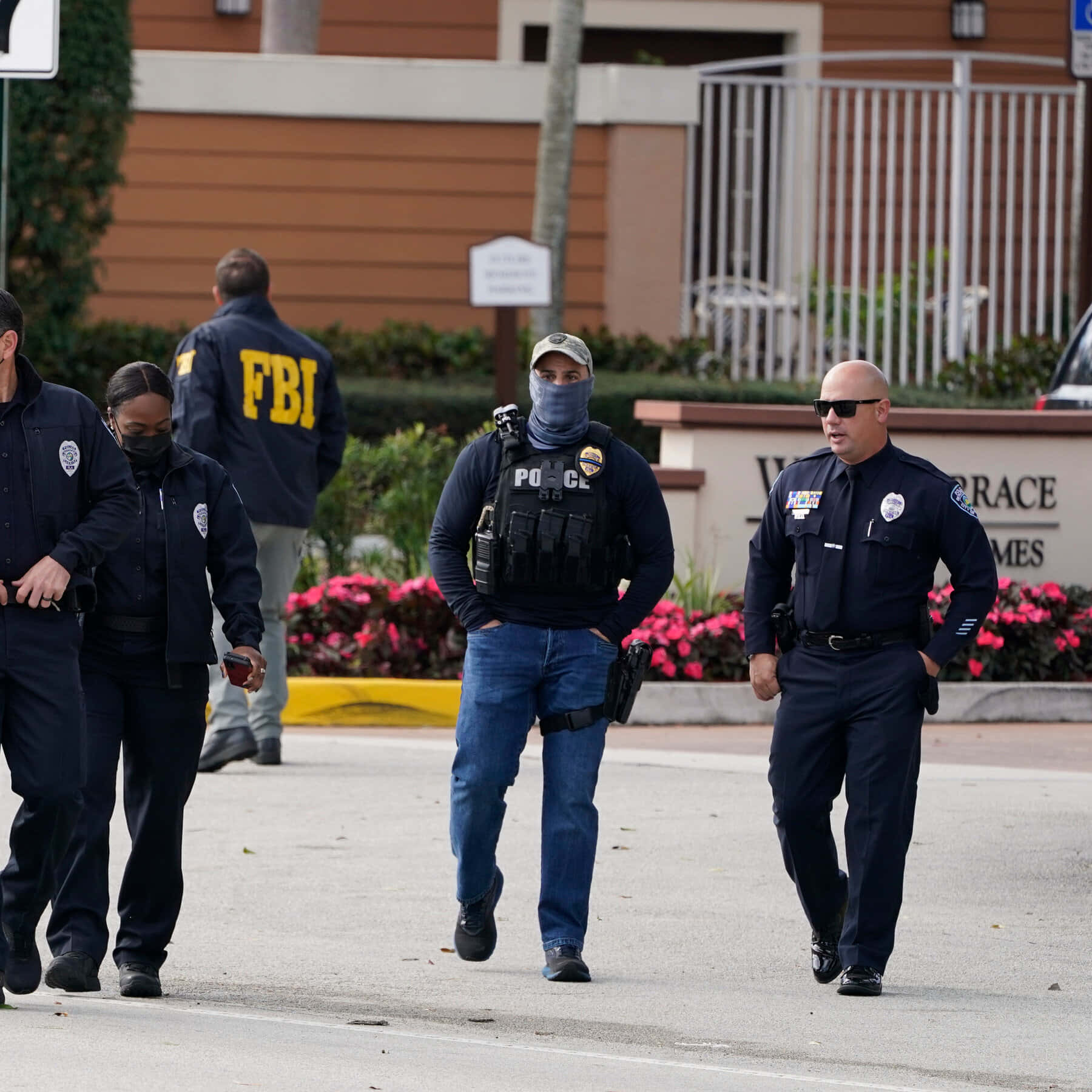 Fbi Agents Walk Down The Street In Uniform Wallpaper