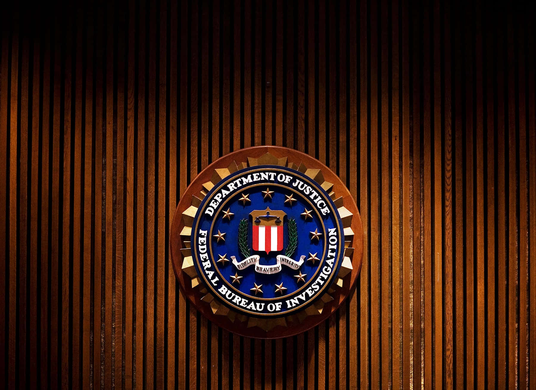 The Fbi Logo Is On A Wooden Wall Wallpaper