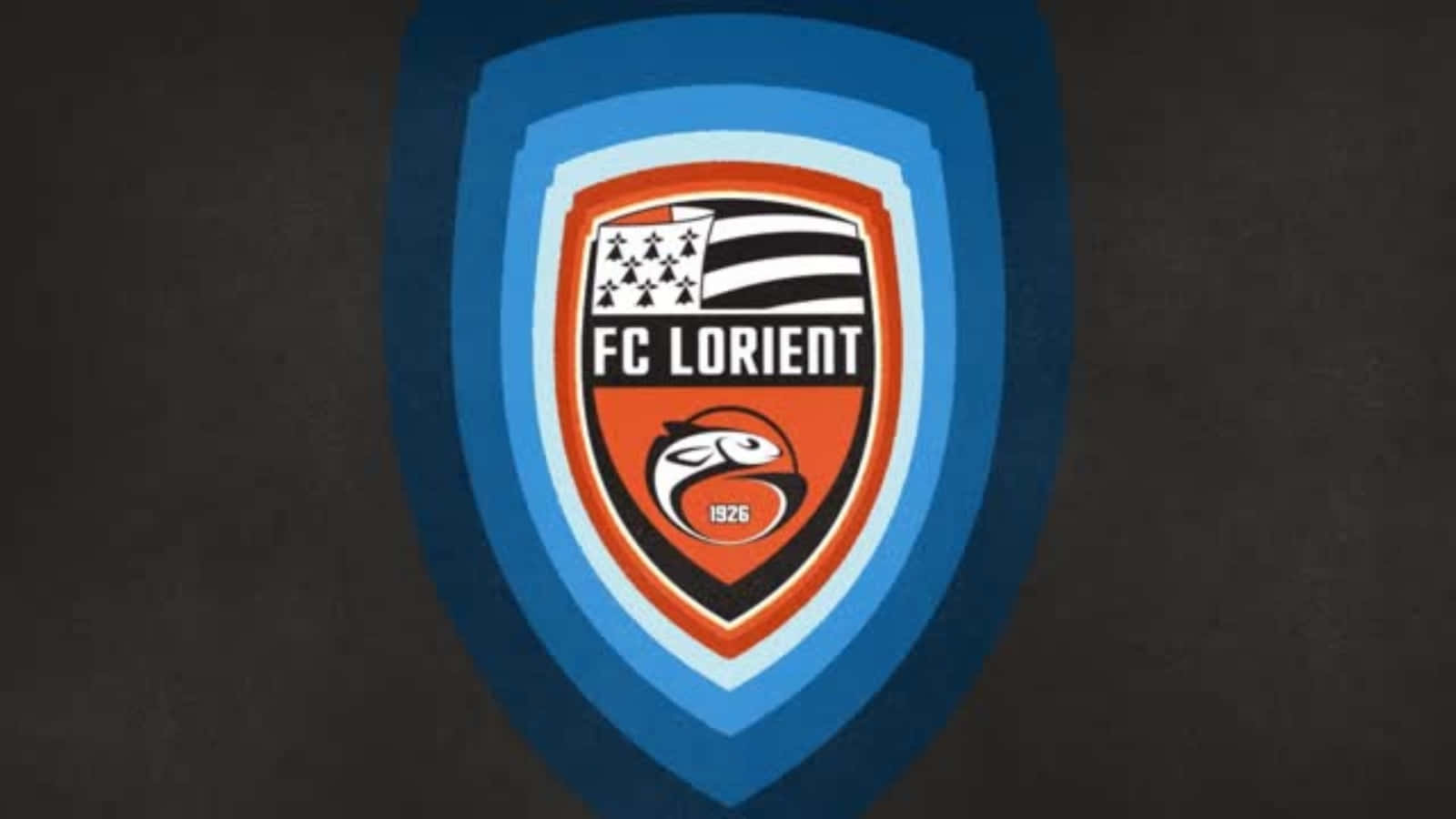 Fc Lorient Players Celebrating Victory On The Field Wallpaper
