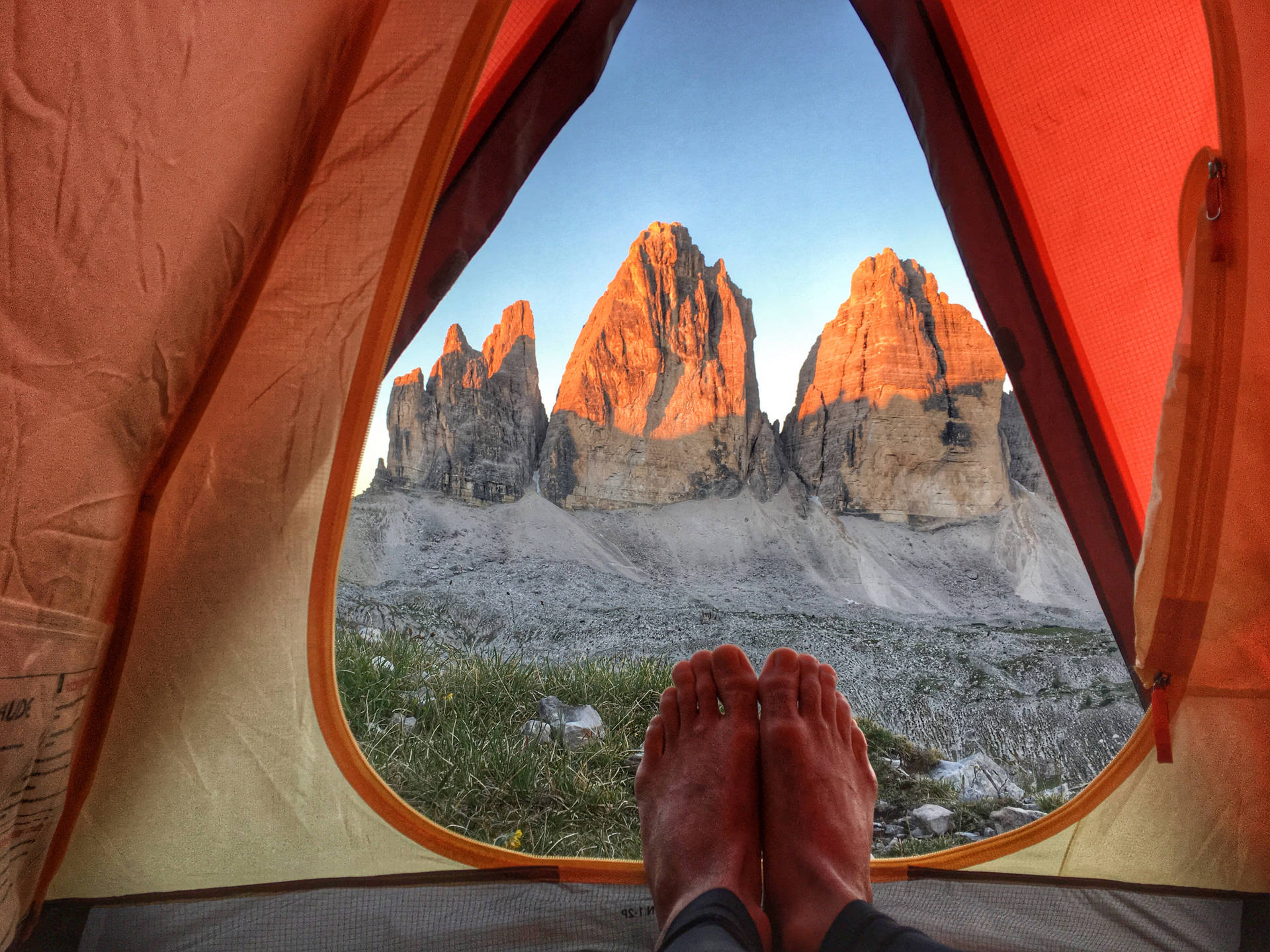 Feet Inside Of A Camping Tent Wallpaper