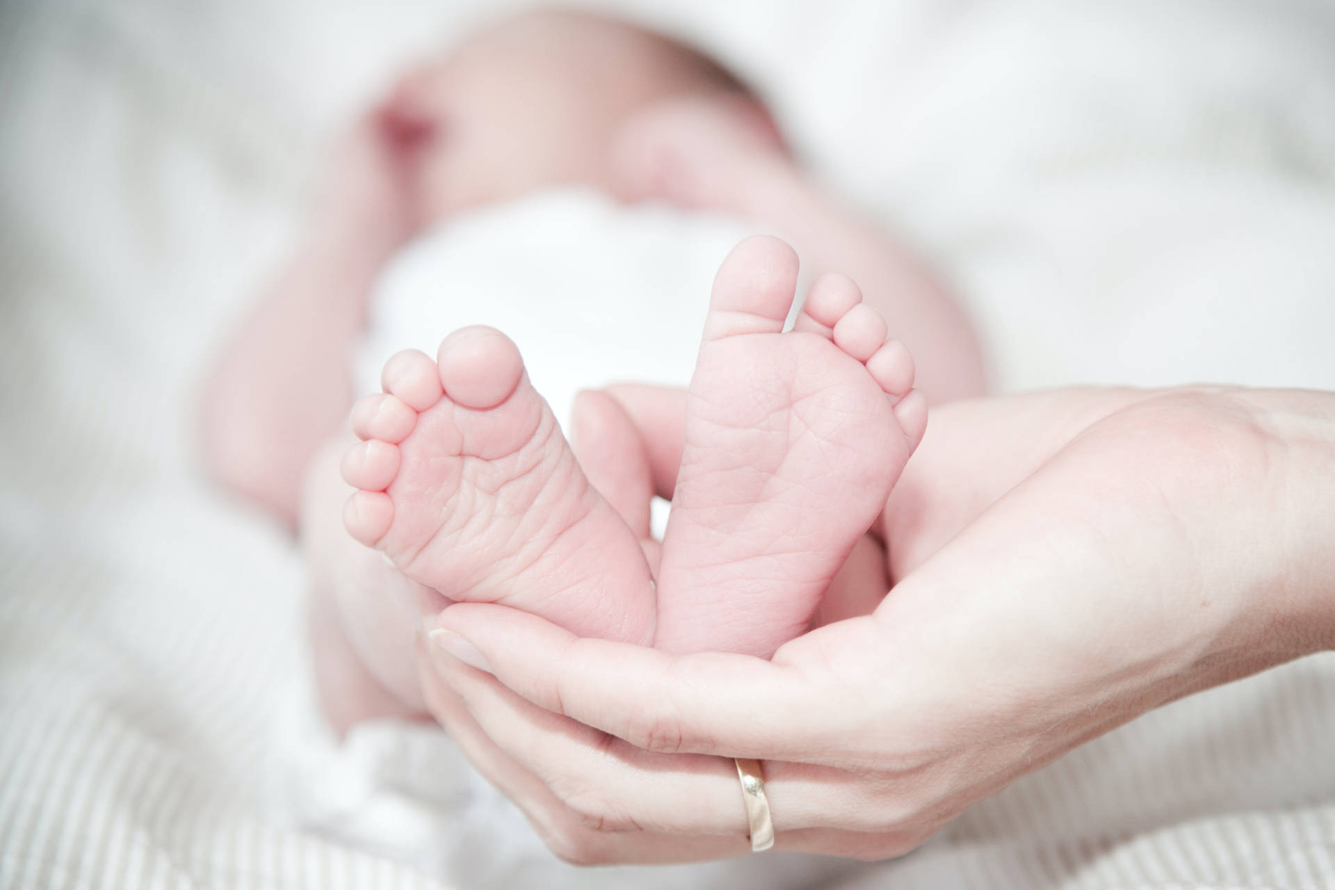 Feet Of A Newborn Baby Wallpaper