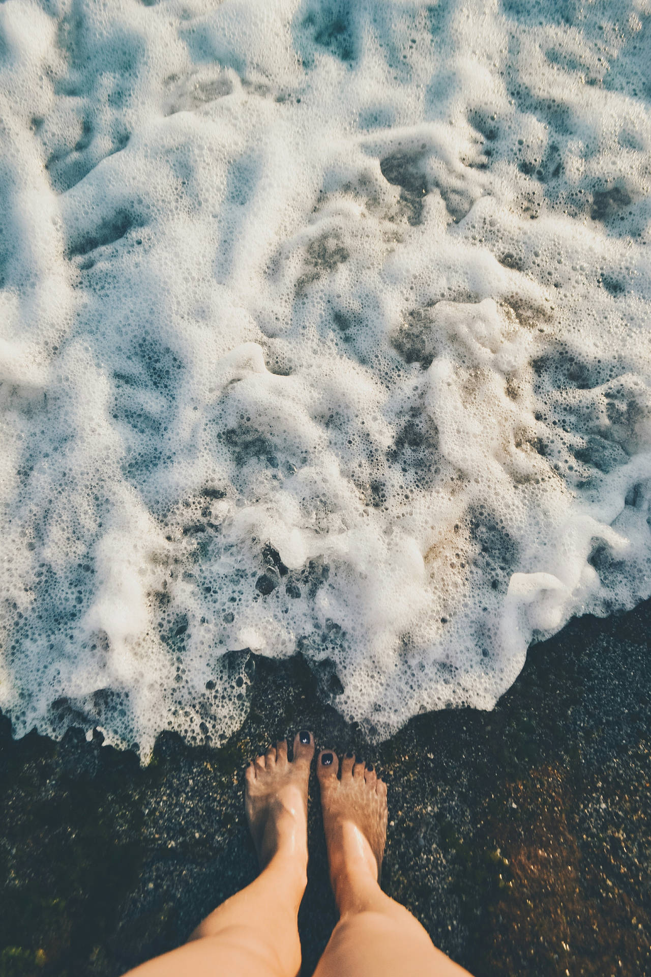 Feet With Foamy Sea Waves Wallpaper