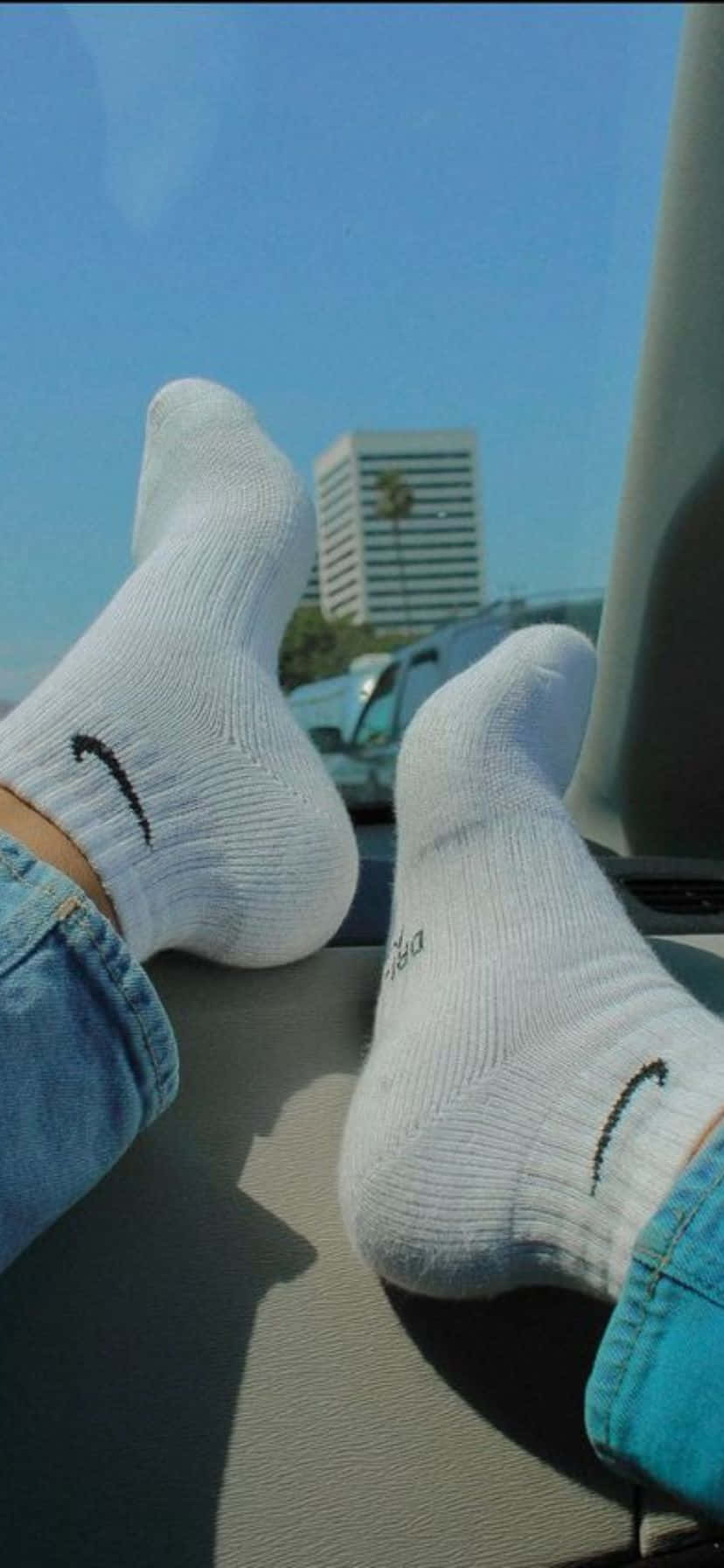 Feeton Car Dashboardin White Socks Wallpaper