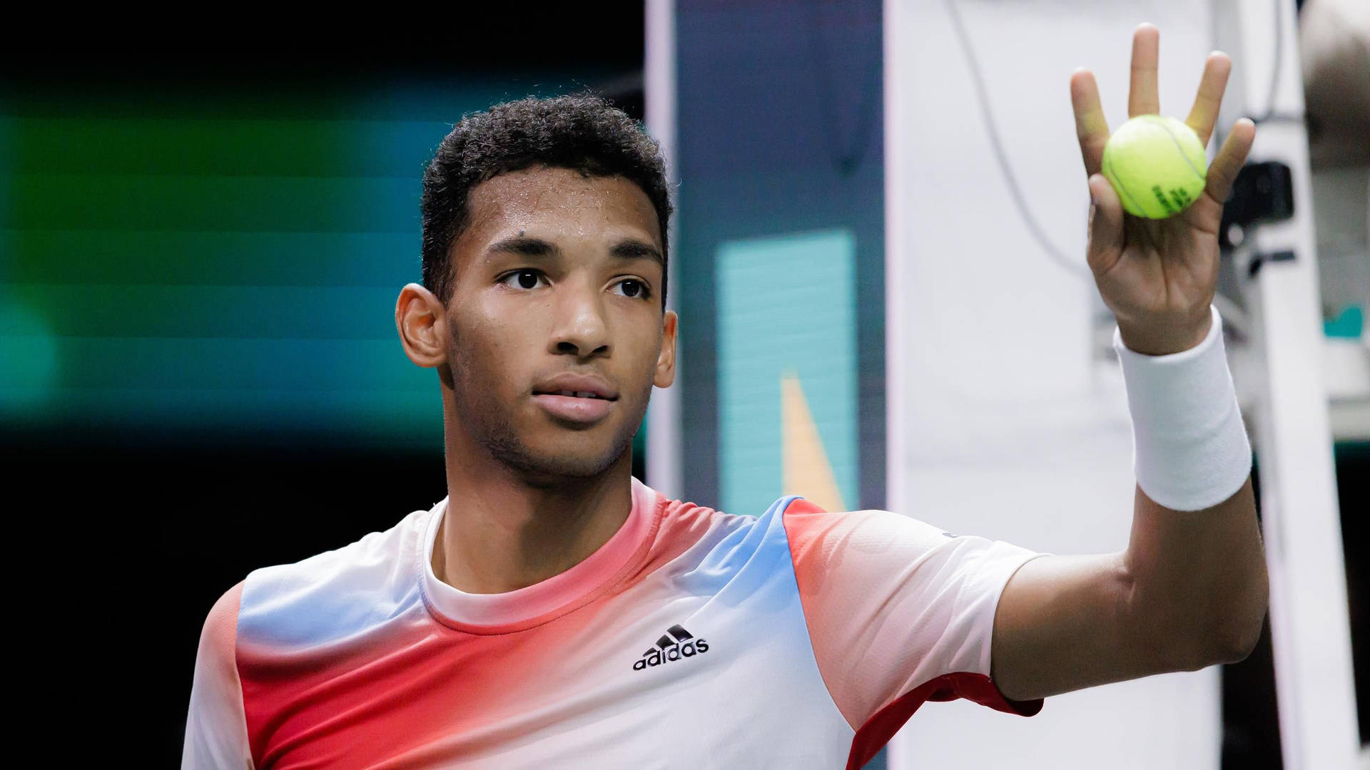 Felix Auger-Aliassime Concentrating on the Ball Wallpaper