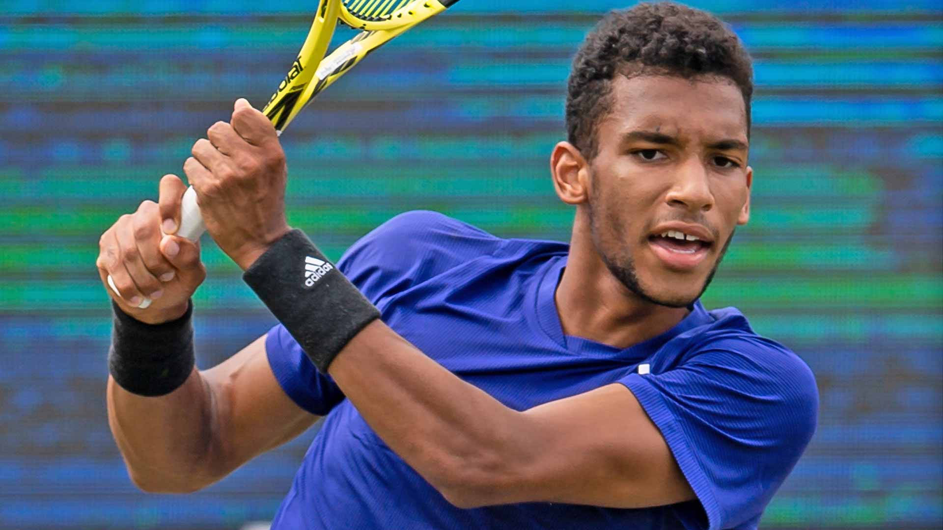 Download Felix Auger Aliassime Serious Game Face Wallpaper | Wallpapers.com