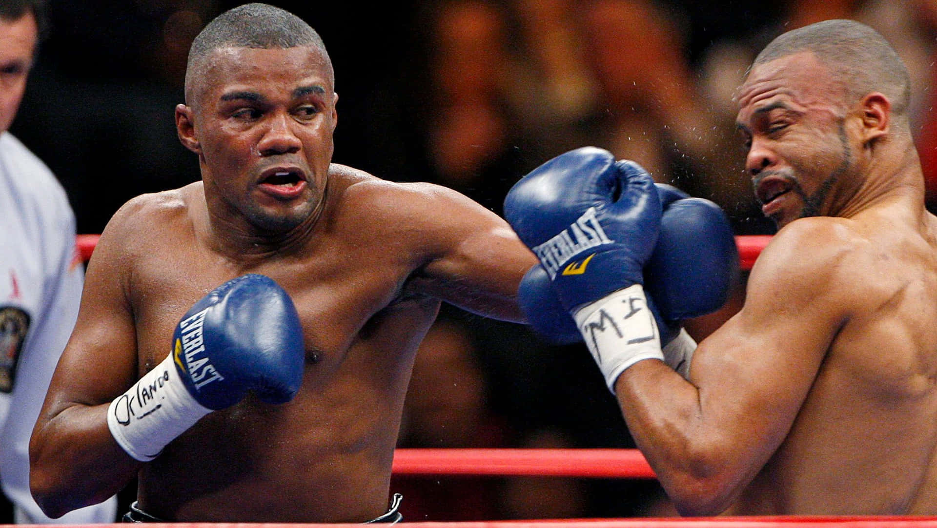 Felix Trinidad On His Dark Blue Boxing Gloves Wallpaper