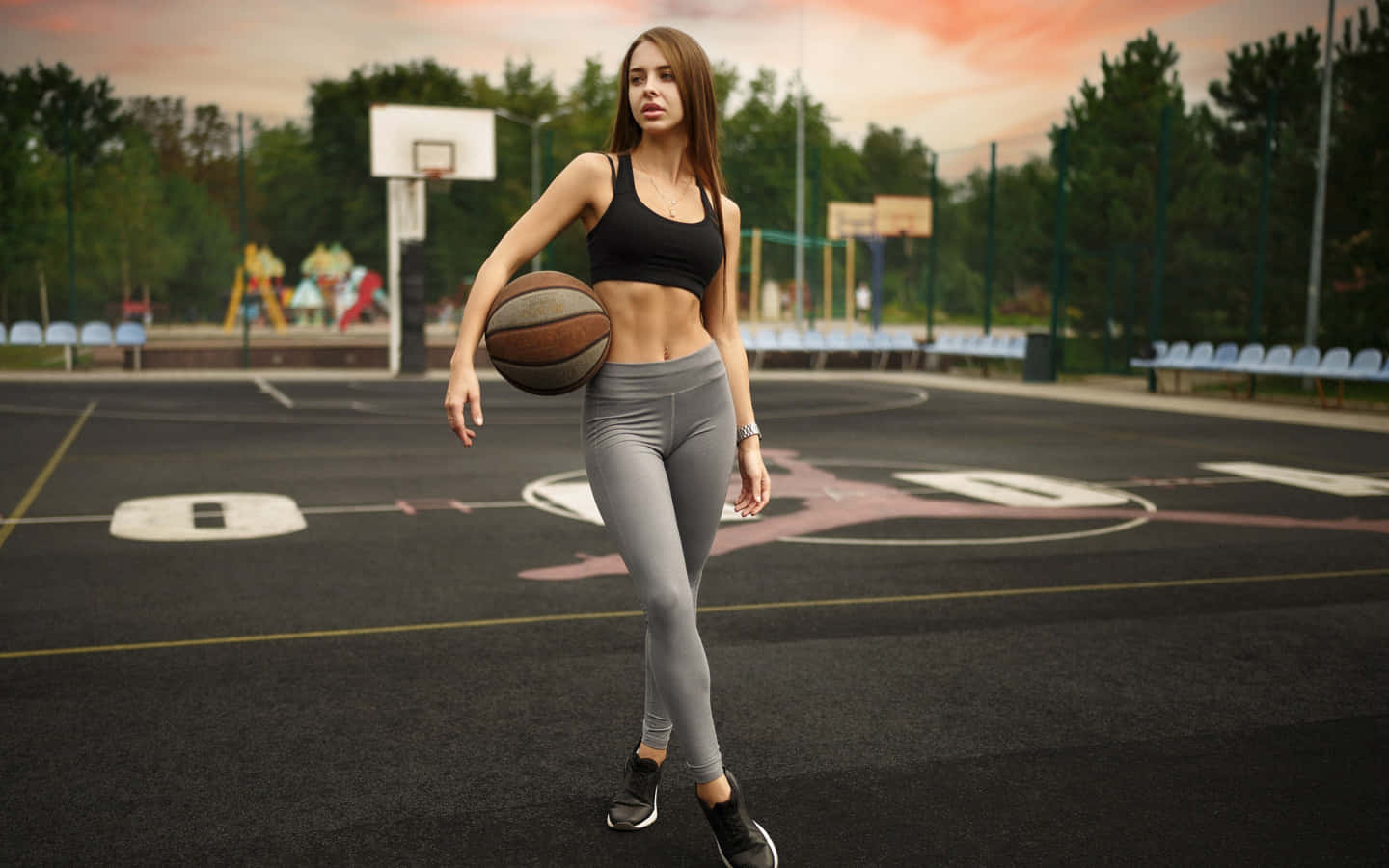 Female Basketball Player Outdoor Court.jpg Wallpaper