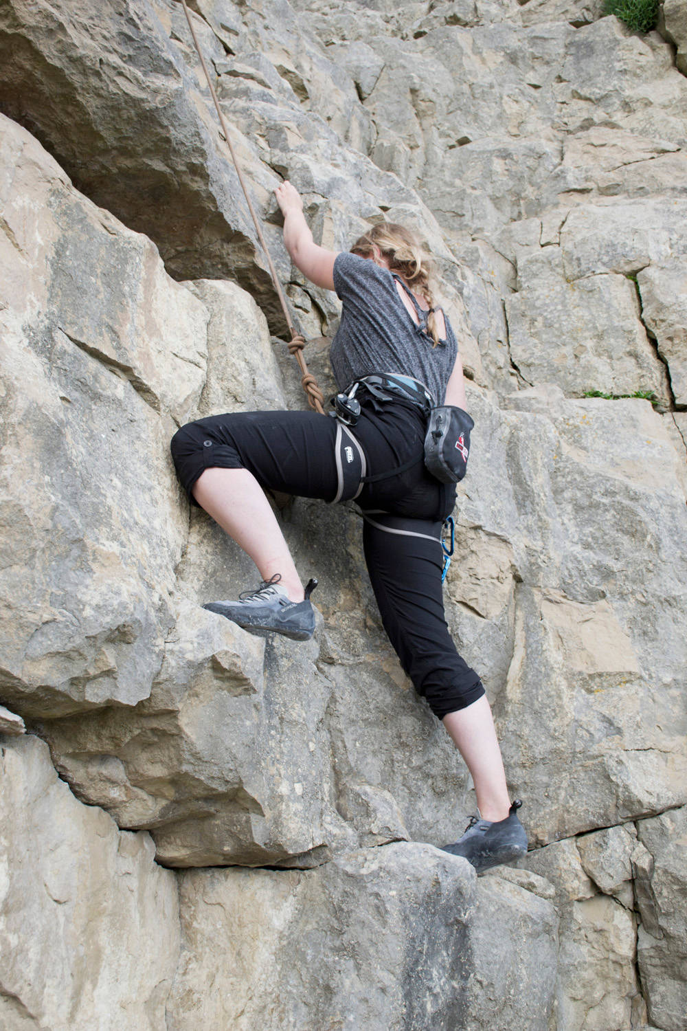 Female Crawling Up Sport Climbing Wallpaper