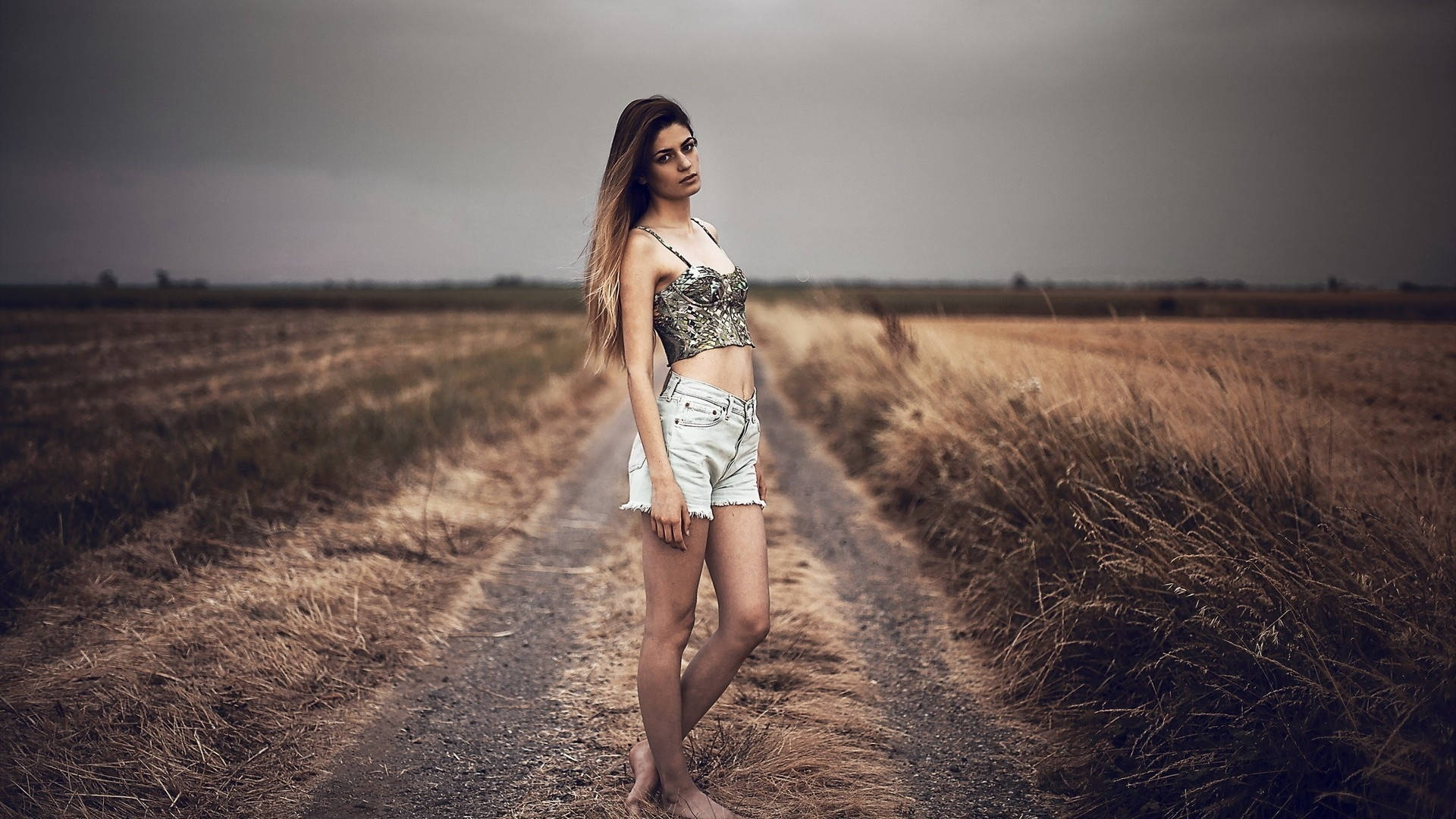 Female Model On Country Road Wallpaper